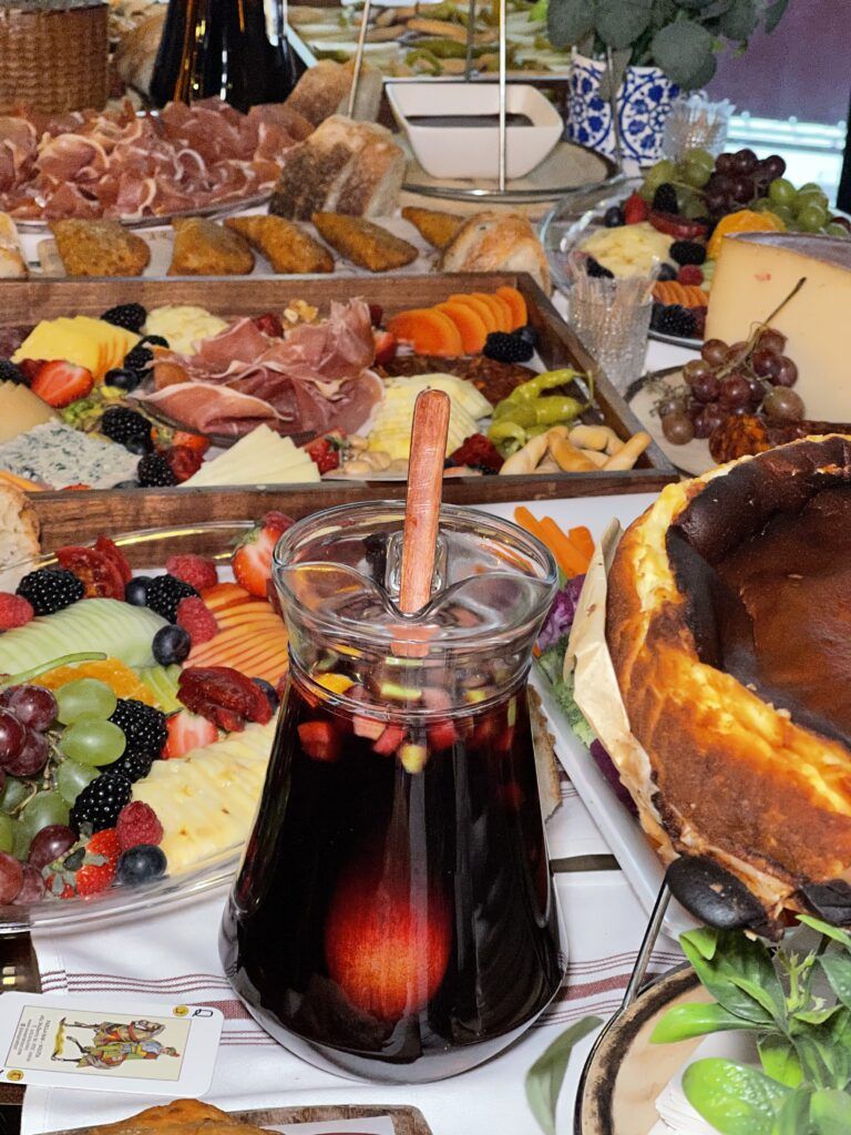 Food display on grazing table with Jamón, spanish cheese and other specialties