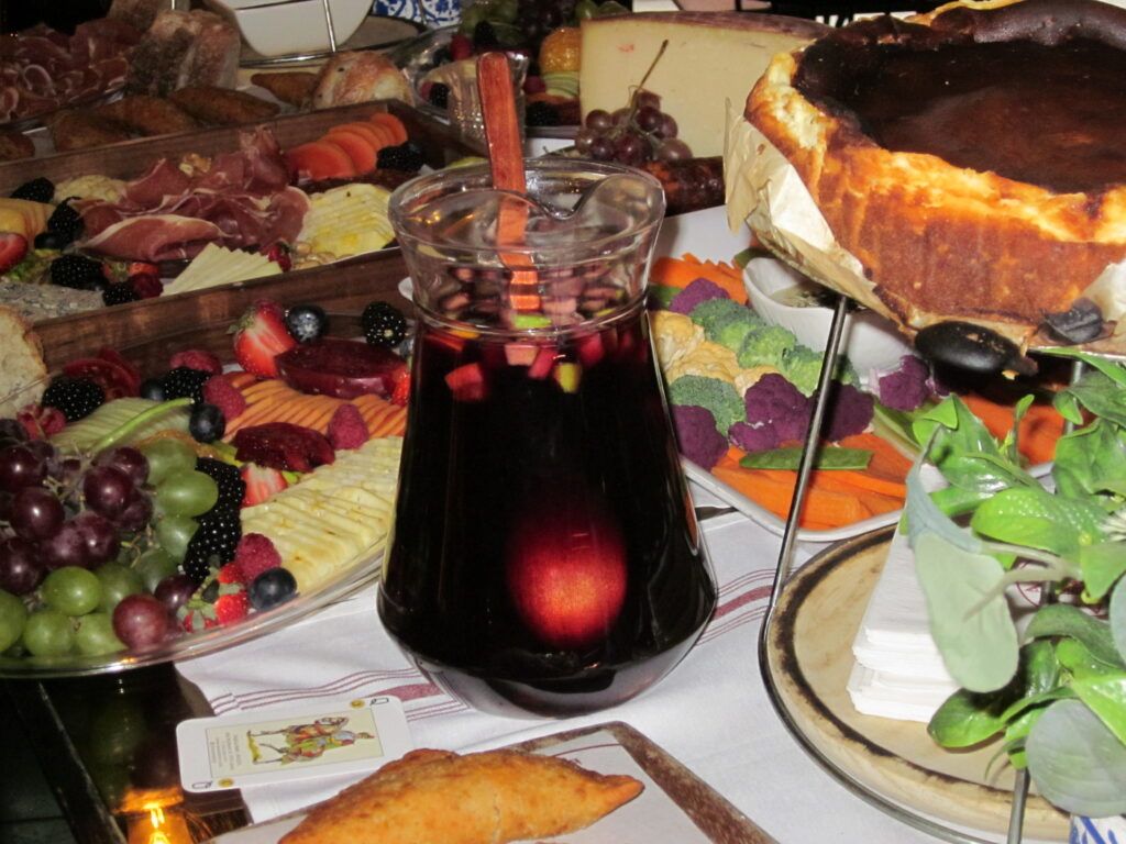 Beautiful grazing table arrangement with seasonal fruits and cured meats